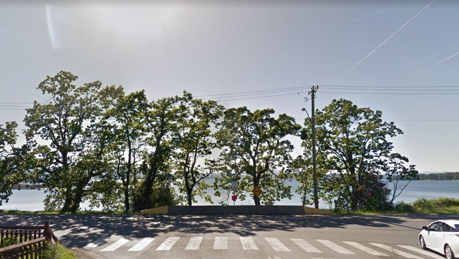 First responders were called to the intersection of Mills Road and West Saanich Road, near the Victoria International Airport, just before 9 p.m. Saturday. (Google Maps)