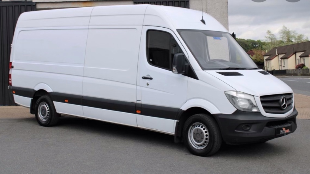 A stock photo of a van similar to the one reported in the incident is shown.