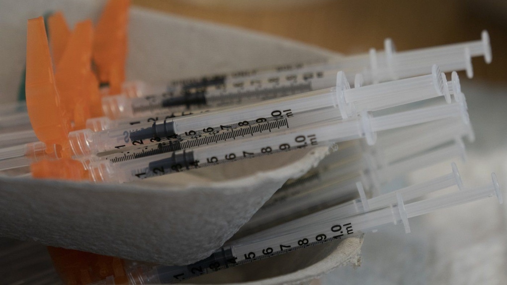 Needles are seen filled with the vaccination for COVID-19 at a truck stop on highway 91 North in Delta, B.C., Wednesday, June 16, 2021. (THE CANADIAN PRESS/Jonathan Hayward)