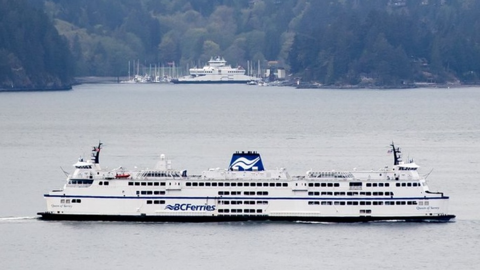 The BC Ferries vessel Queen of Surrey passes Bowen Island while traveling on Howe Sound from Horseshoe Bay to Langdale, B.C., on Friday, April 23, 2021. THE CANADIAN PRESS/Darryl Dyck