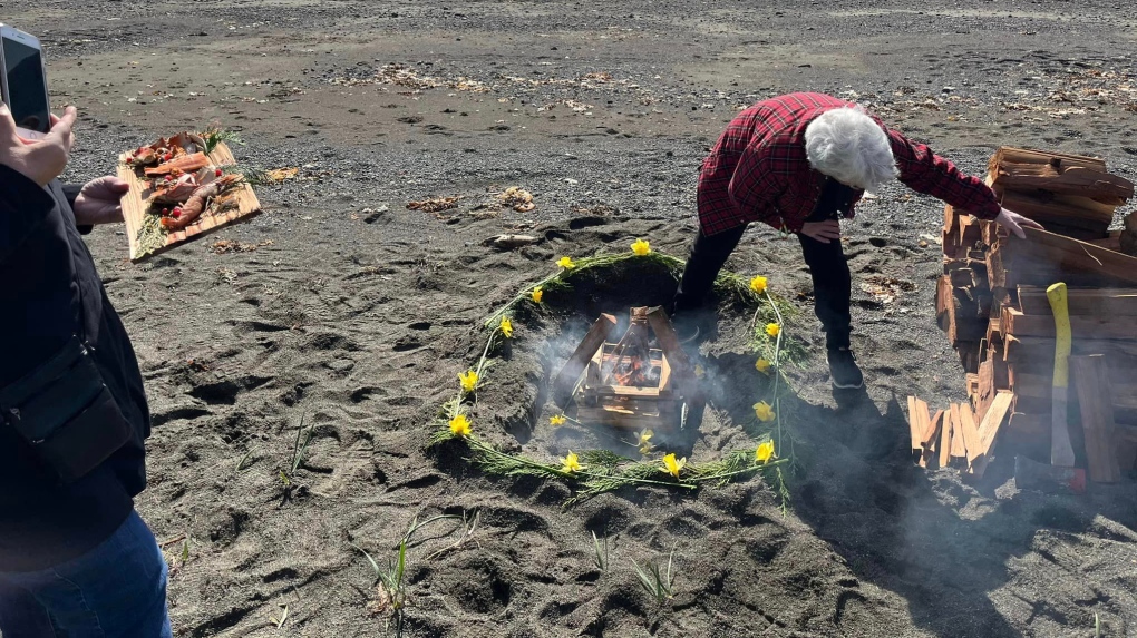 The Skidegate Health Centre on Haida Gwaii hosted a sacred fire on the beach Monday to honour the men who died. (Skidegate Health Centre)