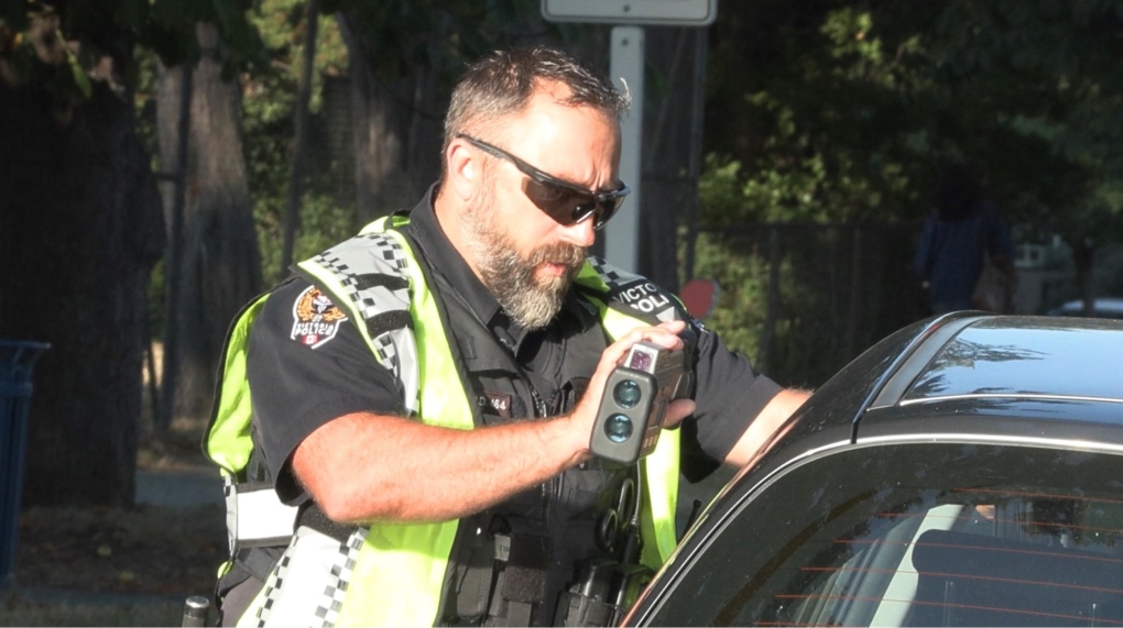 A Victoria police officer pulled a driver over in a school zone outside of South Park Elementary School in Victoria on Sept 5, 2023. (CTV News)

